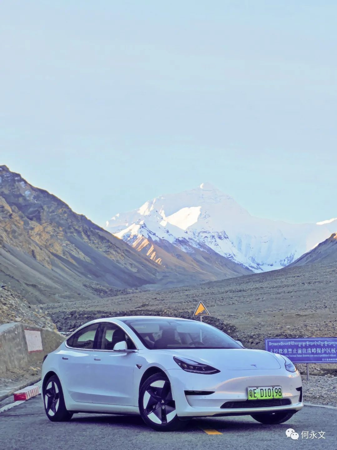 Tesla (with self-made reflective wheels) under Mount Everest