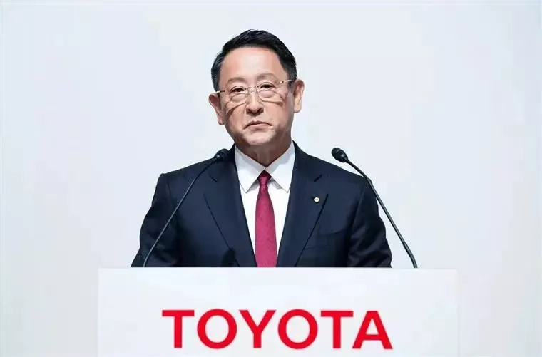 Akio Toyoda speaking at the Japan Automobile Manufacturers Association (JAMA) annual meeting, where he criticized electric vehicles