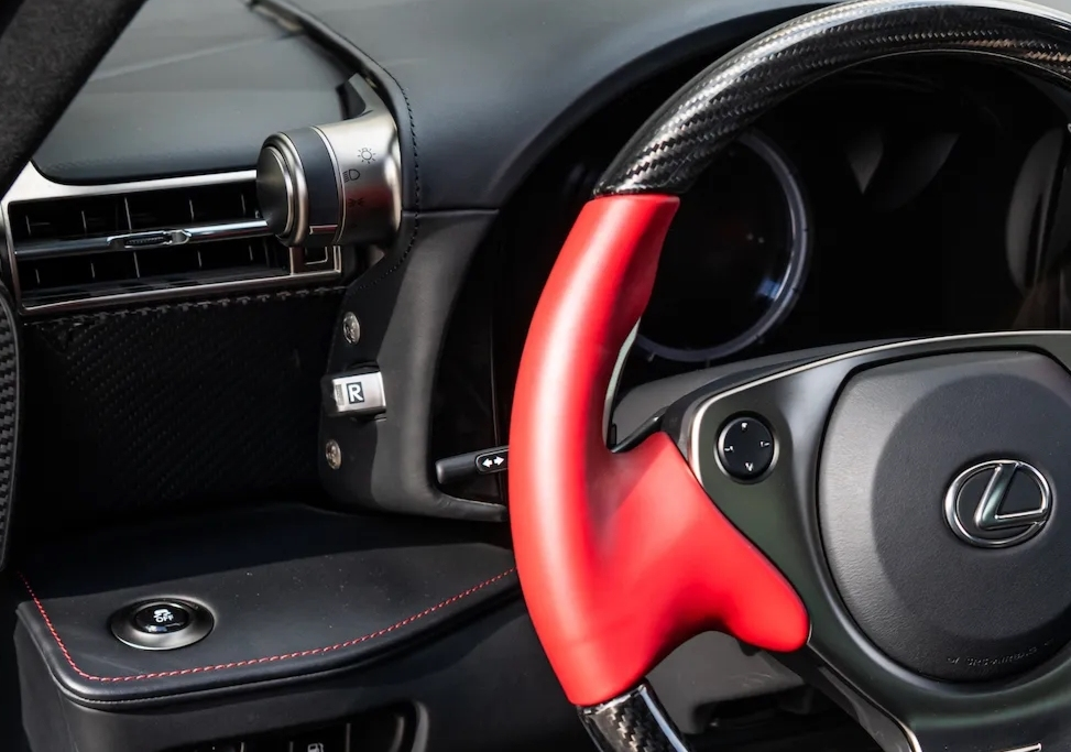 The LFA's gear lever is located alone on the left side of the instrument panel.