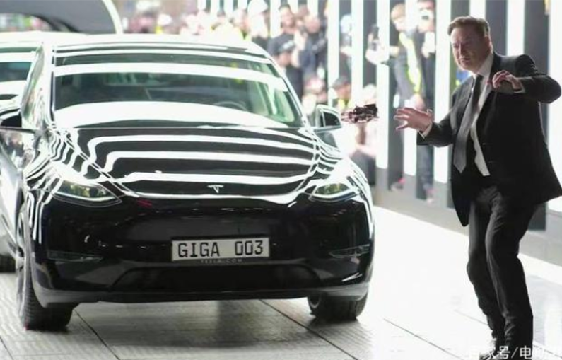 Musk dancing at the Model Y delivery ceremony