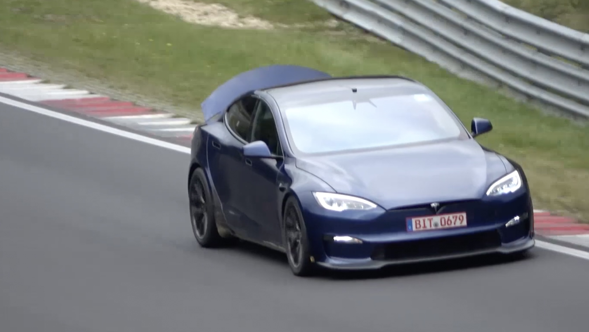 Model S Plaid equipped with active rear spoiler spotted at Nurburgring.