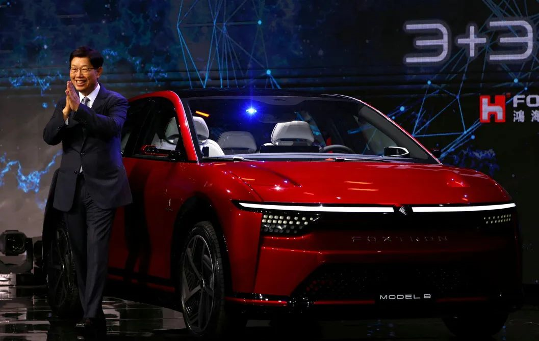 Can Foxconn realize its plan to build cars, including manufacturing Tesla vehicles through contract manufacturing?