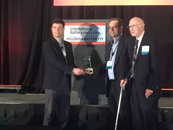 Kurt Kelty receives the Annual Battery Innovator Award on behalf of Tesla at the International Battery Seminar & Exhibit