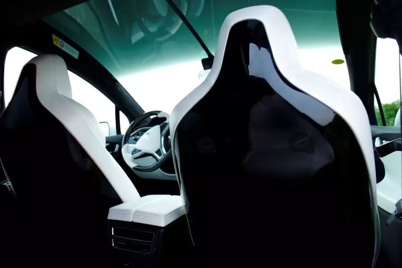 Tesla's "discontinued" glossy black seat back